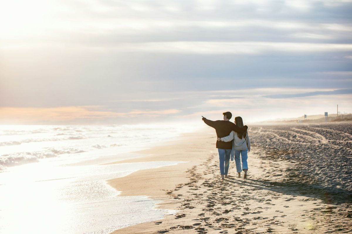 Couple on a scenic beach walk