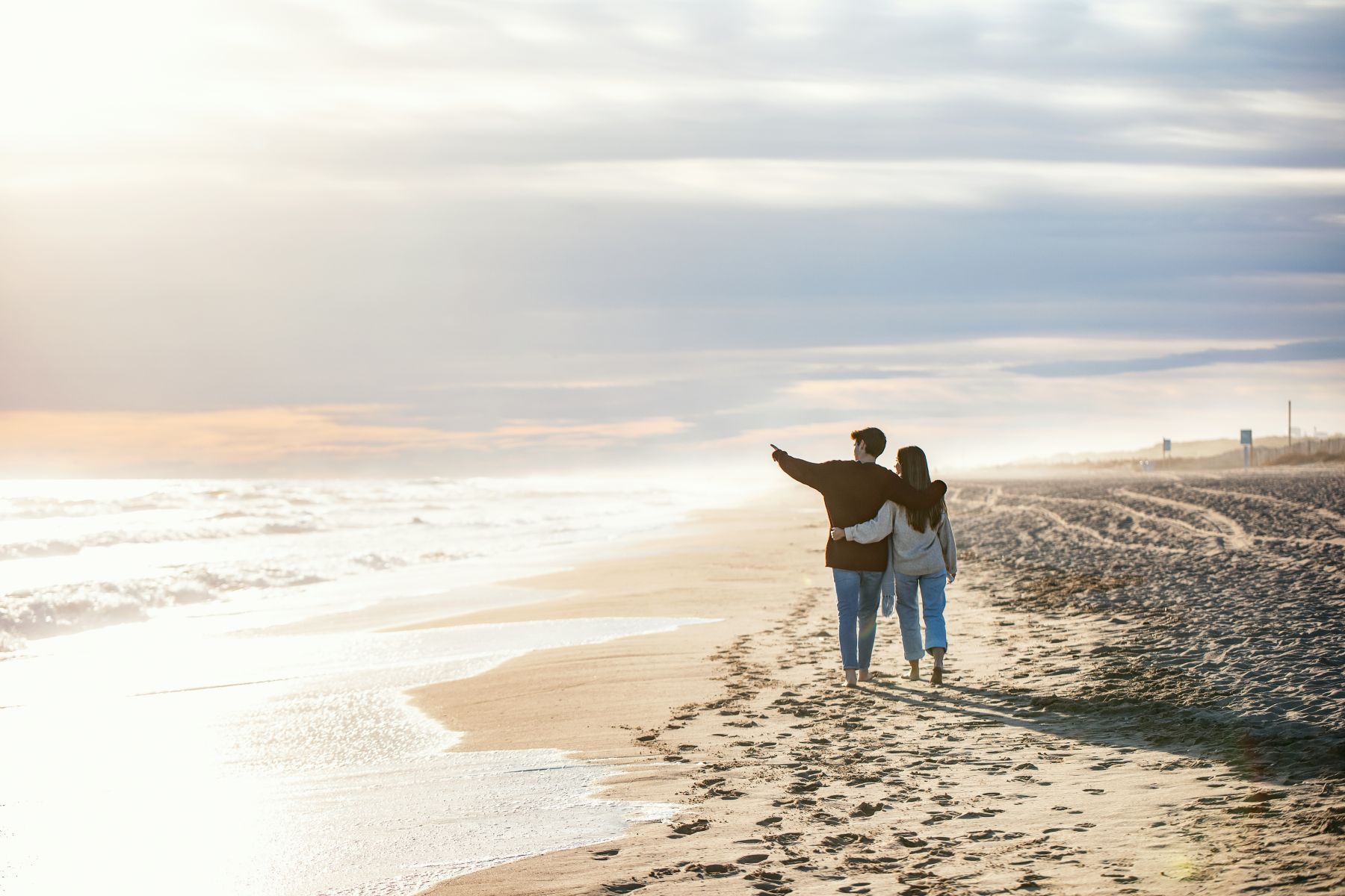 Couple on a scenic beach walk